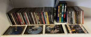 lot 114 image: Misc. CDs Including Purple Rain & More