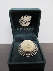 lot 53 image: Signed Korite Carved Bone & Sterling Silver Face Brooch Pendant 