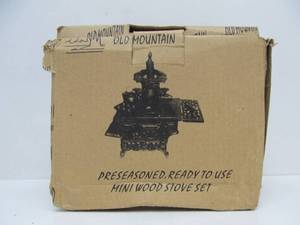lot 22 image: Brand New Cast Iron Mini Wood Stove Set