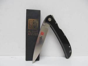 lot 284 image: Unused AL-MAR Eagle Ultralight Folding Knife 
