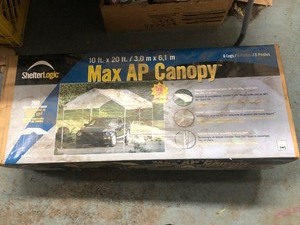 lot 62 image: Brand New Shelter Logic AP Car Canopyy