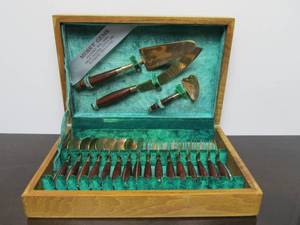 lot 70 image: Smaller Mid Century Rosewood & Brass Flatware Set