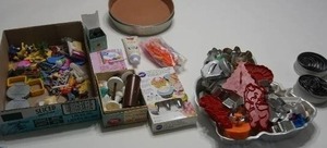 lot 53 image: Cake Decorating Supplies Including Pillsbury Boy Frosting Bag, PADERNO Dough Cookie Cutter Flower and Round Shaped Stainless Steel...