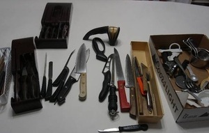 lot 55 image: The Kitchen Drawer...CutCo Knife Set, Measuring Cups Etc.