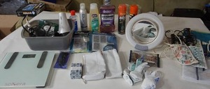 lot 133 image: The Bathroom Vanity Cabinet...Lighted Vanity Mirror, Selvera Scale, Blow Dryer, Curling Irons...