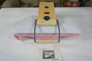 lot 163 image: Magic Press Singer 4 Electric Ironing Board