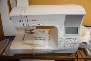lot 217 image: Quantum Stylist 9960 Sewing Machine, Cabinet, Chair and Accessories... THIS IS LOCATED ON the lower LEVEL Please bring your helpers