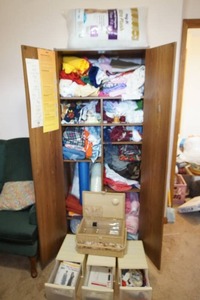 lot 225 image: Sewing Supplies...Storage Cabinet, Bins Fabric Patterns Etc.