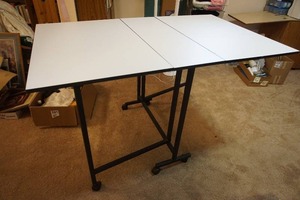 lot 242 image: Arts and Crafts...Rolling Gate Leg Drop Leaf Work Table...