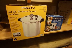 lot 278 image: Home Essentials...Presto 23-Quart Aluminum Pressure Canner and Cooker, Presto #01362 6-Quart Stainless Steel Pressure Cooker