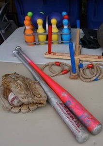 lot 296 image: Kids Outdoor Sporting Goods and Toys...Griffin Phoenix Disc Golf Frisbee, Bowling, Ring Toss MD Sports, Professional Grade Bean Bag Set, Aluminum Bats, Glove Etc.
