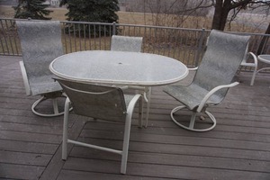 lot 303 image: Outdoor Pation Furniture Set Two Swivel Rocker Captain Chairs and Two Arm Chairs Oval Glass Top Table wCenter Hole