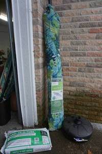 lot 314 image: Outdoor Patio Umbrella, Base and Sand Bag
