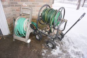 lot 318 image: Garden Hose and Reel