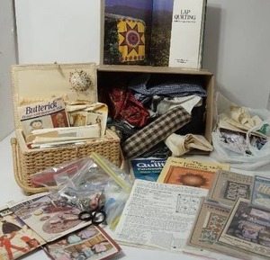 lot 76 image: Wicker Sewing Basket With Handle-Lap Quilting Book-Craft Patterns-& Miscellaneous Pieces Of Material