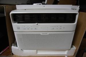 lot 149 image: Toshiba White Window Air Conditioner With Remote--RAC-WK121ESCWRU