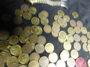 lot 180 image: Lot of tokens, imitation Rolex and Marvel stickers