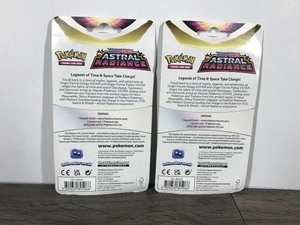 lot 124 image: POKEMON Sword & Shield Oricorio & Toxel Booster Packs (2 - Unopened packs with coin in the front)