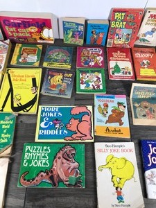 lot 134 image: Lot of Books - MAD - Charlie BrownSnoopy - Joke Books - The Pink Panther - Yogi Bear & More