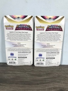 lot 360 image: POKEMON Sword & Shield Toxel Booster Packs (2 - Unopened packs with coin in the front)