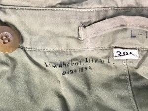 lot 391 image: WORLD WAR II REGULATION ARMY OFFICERS OCOAT FIELD SIZE 39L (Name of Soldier is Written Inside of Coat)