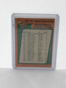 lot 423 image: 1978-79 Topps Hockey Card # 199 Minnesota North Stars Team Hockey Card Signed by Steve Jensen Left Wing