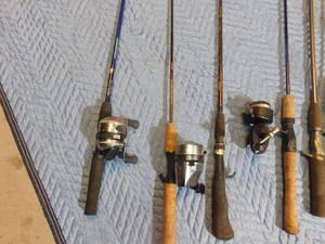 lot 201 image: 2 Steel and 6 other fishing rods and 5 reels