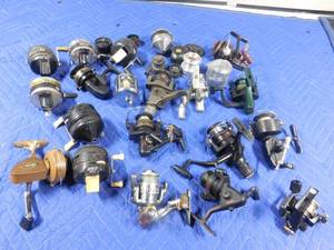 lot 205 image: Box of fishing reels and parts