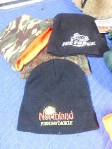 lot 223 image: Winter caps, Coleman dog reversable vest, foot warmers and gloves