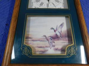 lot 227 image: Wood framed battery operated duck clock