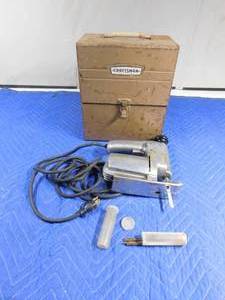 lot 231 image: Vintage Craftsman jig saw with original metal case and blades