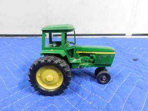 lot 235 image: John Deere metal toy tractor