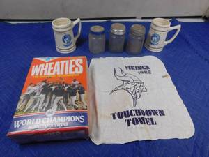 lot 271 image: 1987 World champion Wheaties box, Viking touch down towel, 2 Timberwolfs mugs and 3 Mason jars with lids