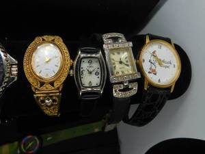 lot 311 image: 9 watches with bands and 1 other