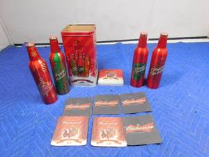 lot 402 image: Budweiser 2006 collector bottles in original tin