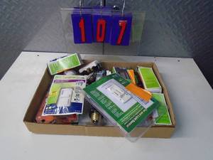 lot 107 image: Flat of electronics or plumbing store pulls. As shown.