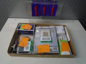 lot 111 image: Flat of electronics or plumbing store pulls. As shown.