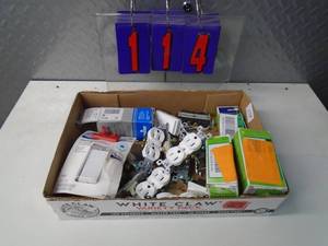 lot 114 image: Flat of electronics or plumbing store pulls. As shown.