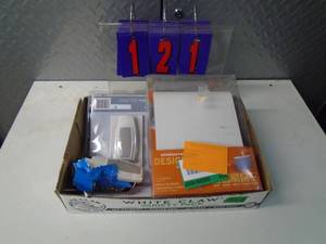lot 121 image: Flat of electronics or plumbing store pulls. As shown.