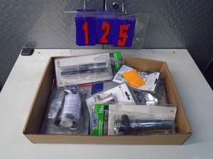 lot 125 image: Flat of electronics or plumbing store pulls. As shown.