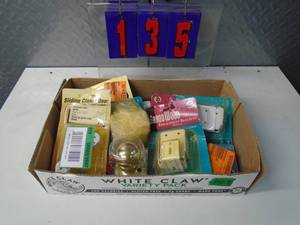 lot 135 image: Flat of electronics or plumbing store pulls. As shown.