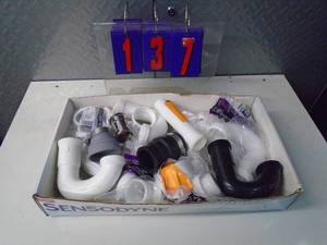 lot 137 image: Flat of electronics or plumbing store pulls. As shown.