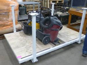 white shipping frame 79x49 with 39 in tall legs that remove for easy loading