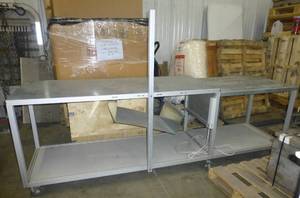 Aluminum table on wheels 28 in wide, 110 long, 34 tall