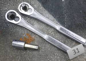 lot of two 38 ratchets and one socket