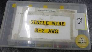 Container of wire crimp lugs
