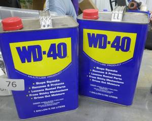 2 gallon cans of WD-40, one full, one maybe 10%