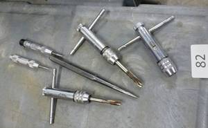 group of tap handles and punches