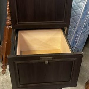 lot 12 image: Wood looking filing cabinet