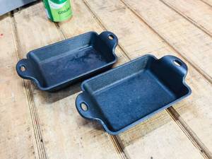lot 30 image: 2 Lodge Cast Iron Mini Rectangle Server